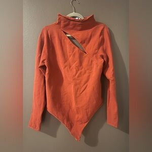 Good American Asymmetrical Long Sleeve Top in Orange